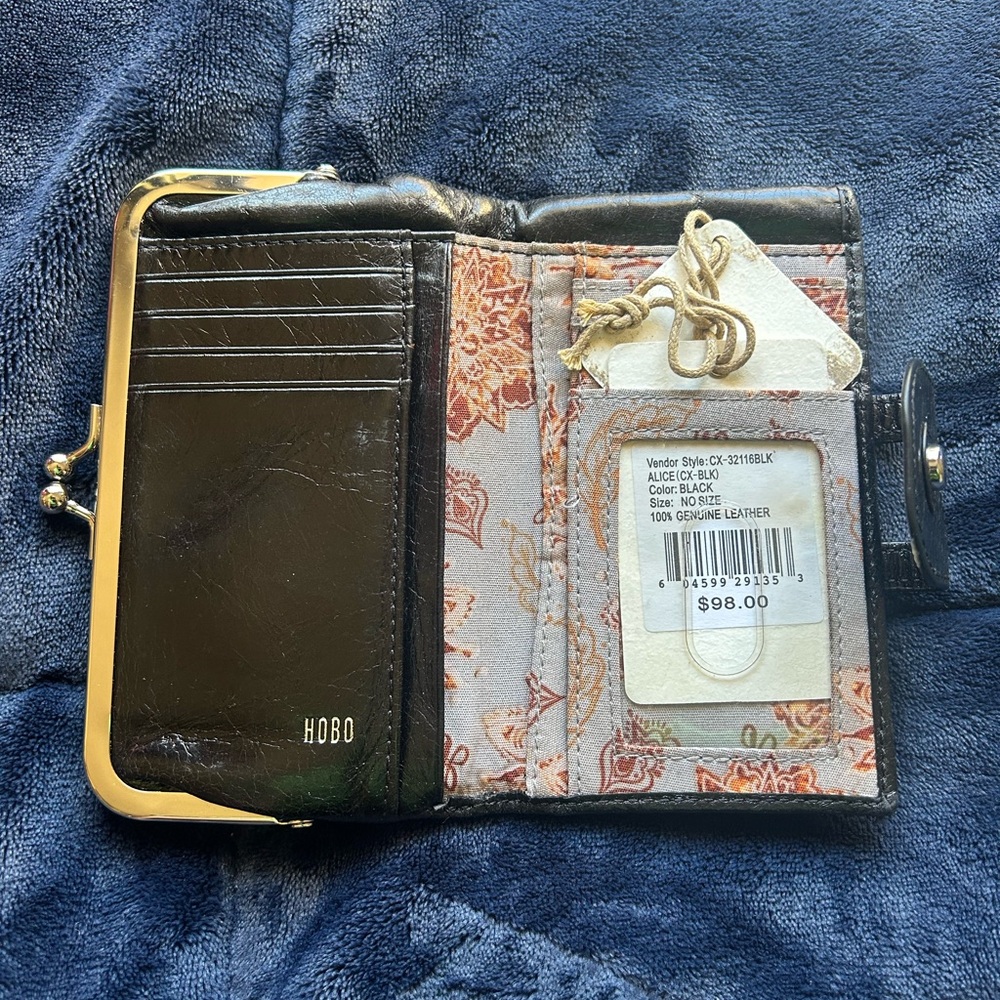 HOBO Alice compact wallet/clutch in black genuine leather.
